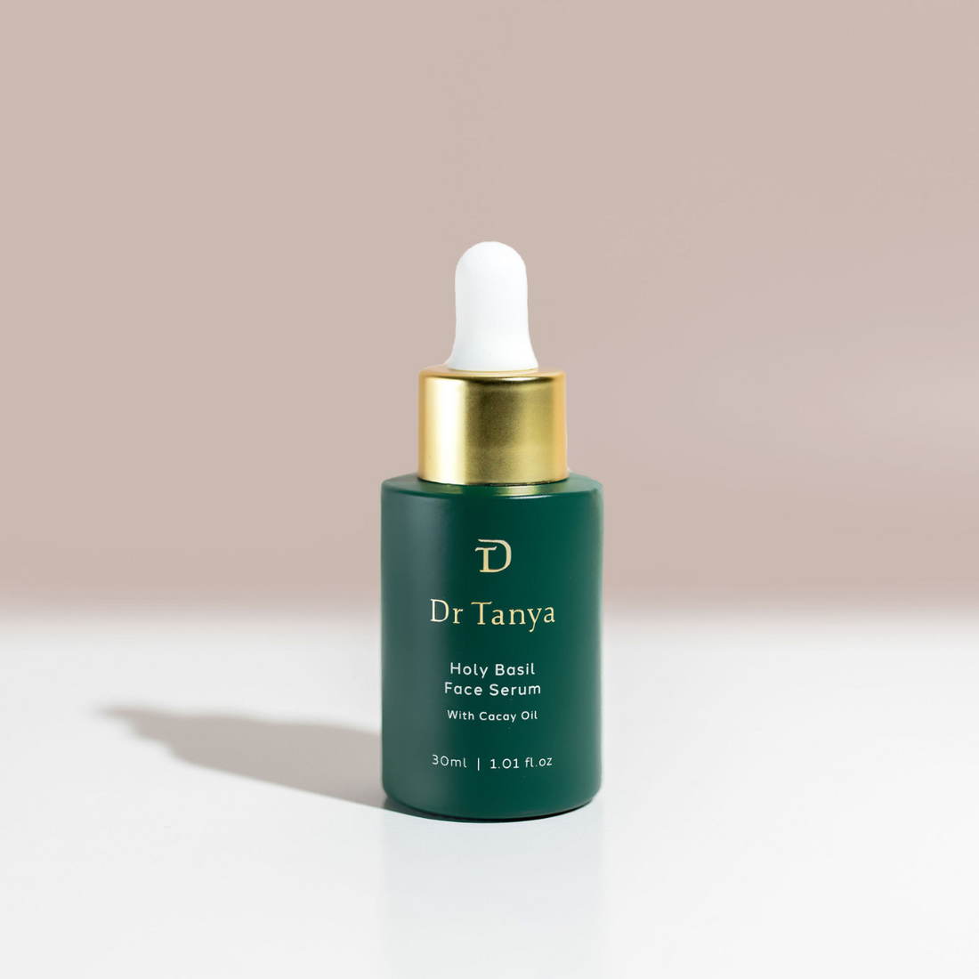 Emerald green bottle of Dr Tanya&