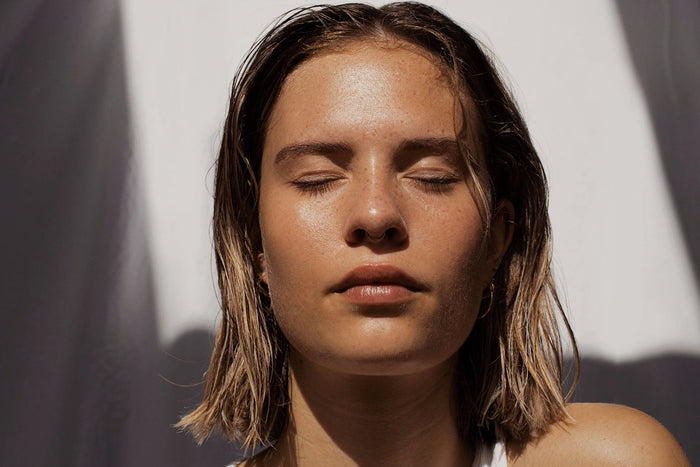 Female With Eyes Closed in Sun