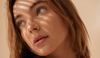 A lady starting into the distance