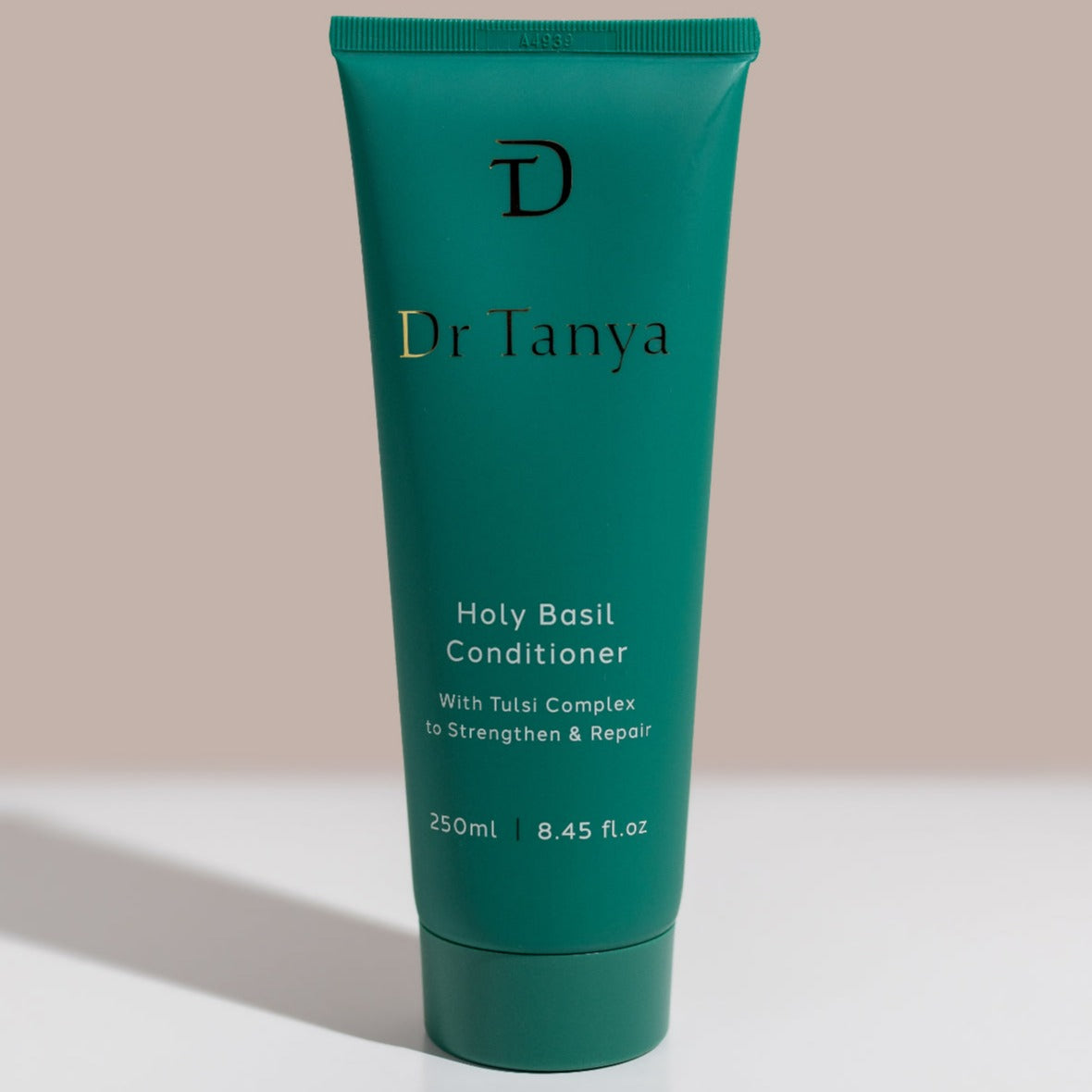A bottle of Dr Tanya's Holy Basil conditioner